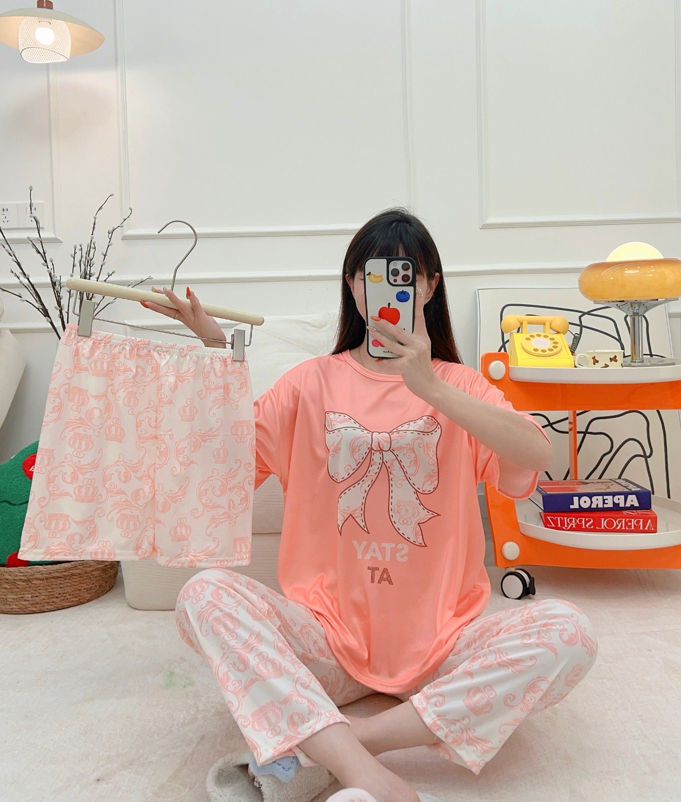 Ladies cute pajama set with top, trouser, and short made from soft milk silk fabric for comfortable sleepwear.