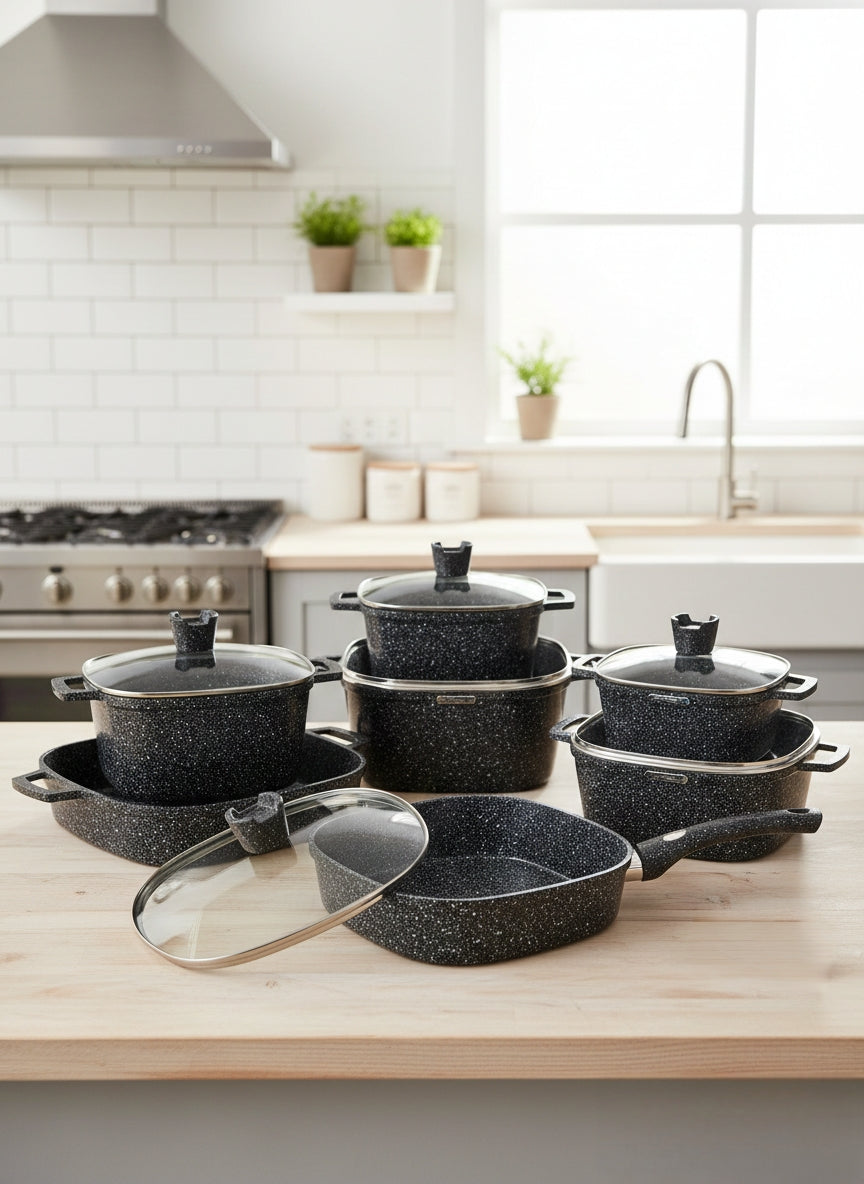 10-piece Square granite cast cookware set in gold, including pots, pans, and lids.
