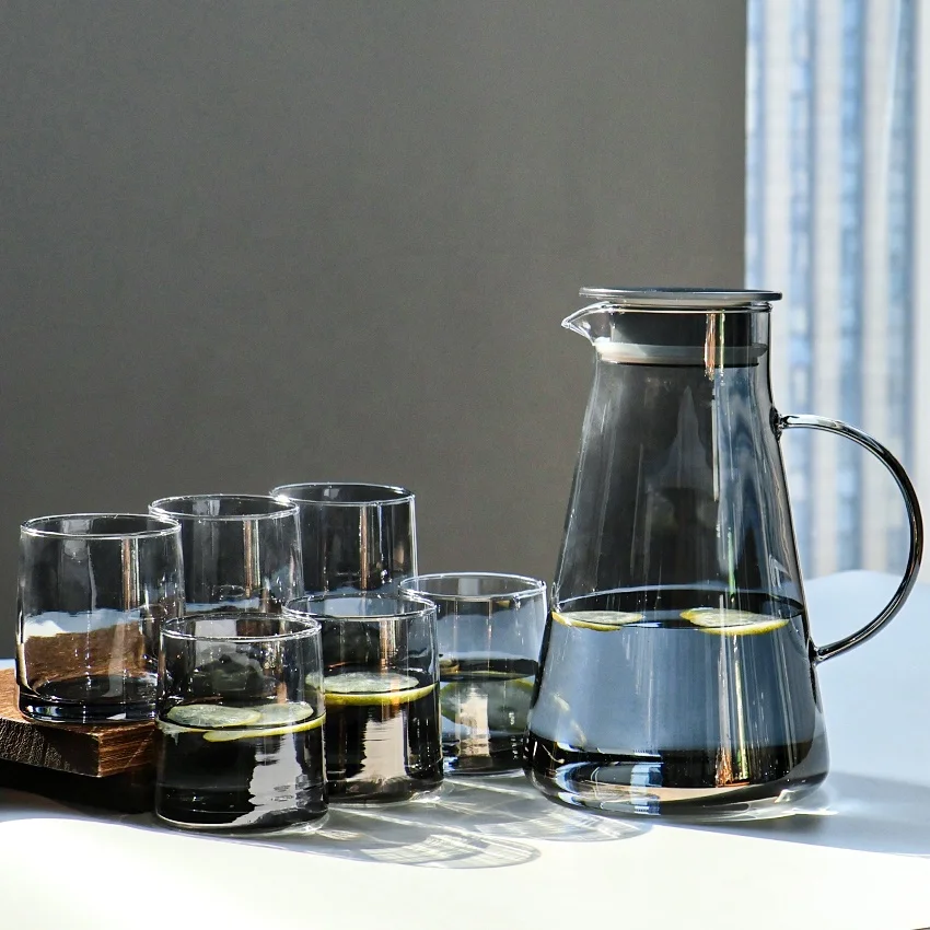 7 piece smoked glass water set with a 1400 ml jug and six 260 ml matching glasses for serving beverages at home or during gatherings.