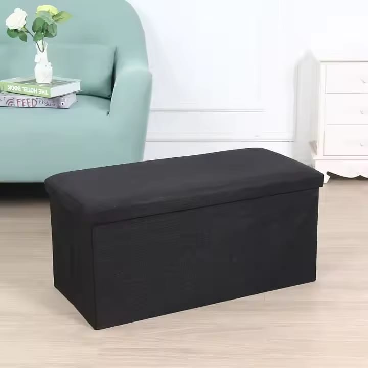 Ottoman storage box with leather finish in black or brown with waterproof base