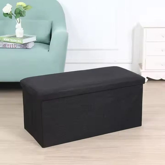 Ottoman storage box with leather finish in black or brown with waterproof base