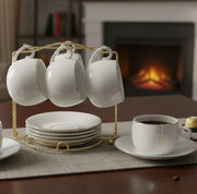 13 Piece tea and coffee set with 6 cups, 6 saucers, and golden stand for elegant serving