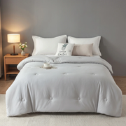 Premium quality duvet with soya bean filling available in grey and cream in 6×6 ft and 7×8 ft sizes.