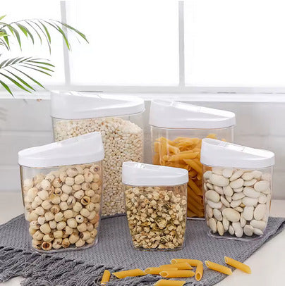 Set of 10 clear acrylic candy containers with white airtight lids in varying capacities.