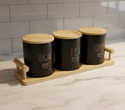 Tea, coffee, and sugar kitchen canister set on a countertop