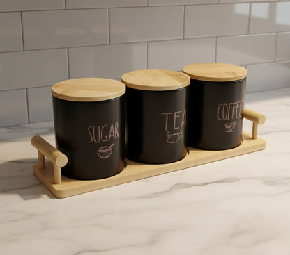 Tea, coffee, and sugar kitchen canister set on a countertop