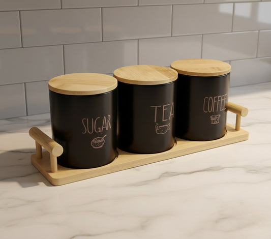 Tea, coffee, and sugar kitchen canister set on a countertop