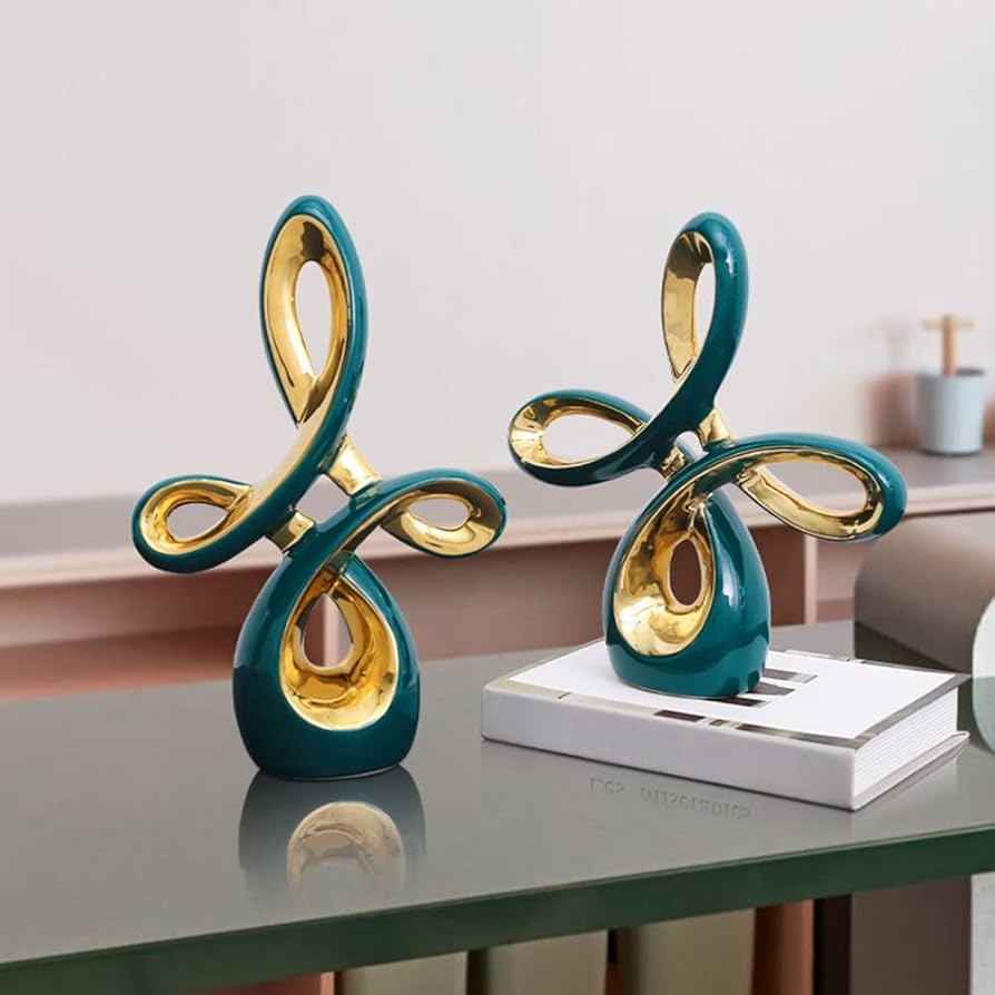 Abstract ceramic golden art sculptures in large and small sizes, modern decorative pieces for home or office décor. 