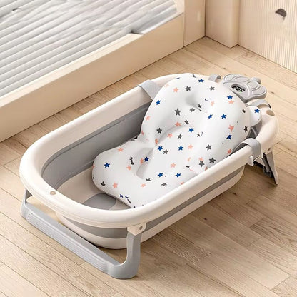 7 in 1 Foldable baby bathtub set with built in thermometer, bath rack, bath net, and accessories for safe baby bathing