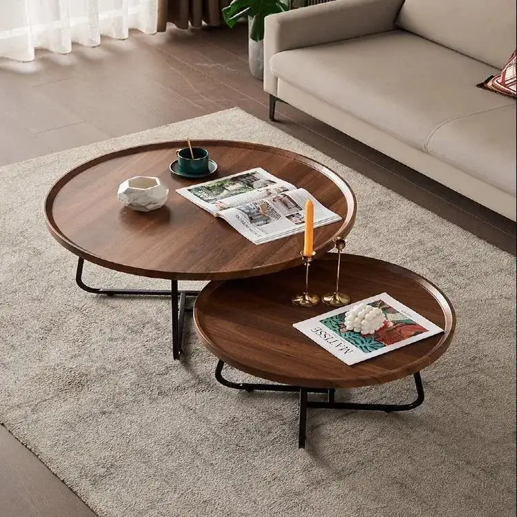 Wooden nesting coffee table set with two tables wood grain tabletop finish black metal legs space saving living room furniture set.