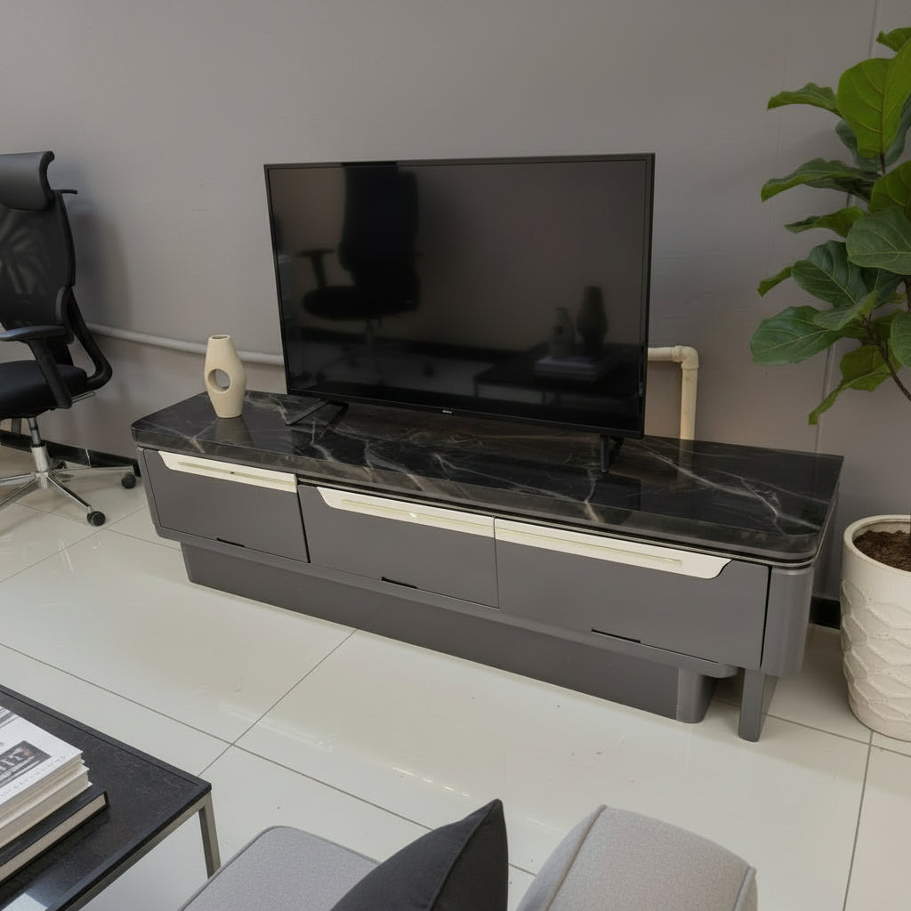 Low profile gray TV media console with dark marble patterned surface and multiple storage drawers TVM1278