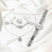Five piece ladies watch gift set including watch, bracelet, necklace, ring, and earrings
