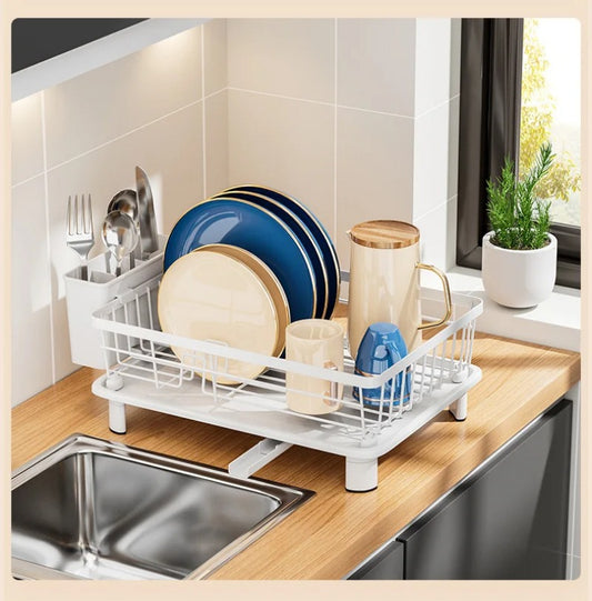 Minimalist white countertop dish drying rack with utensil holder and drainage spout for kitchen organization