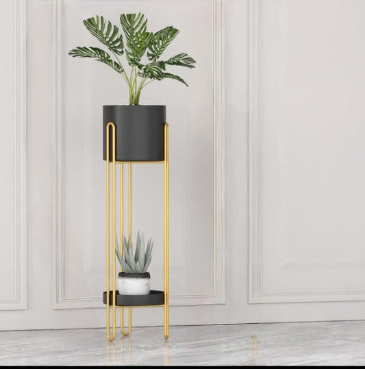 Modern metal plant stand with gold frame, two-level holder for indoor plants and decorative display.