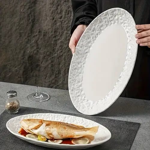 Ceramic oval fish plate oven safe serving dish available in 10 inch and 12 inch sizes. 