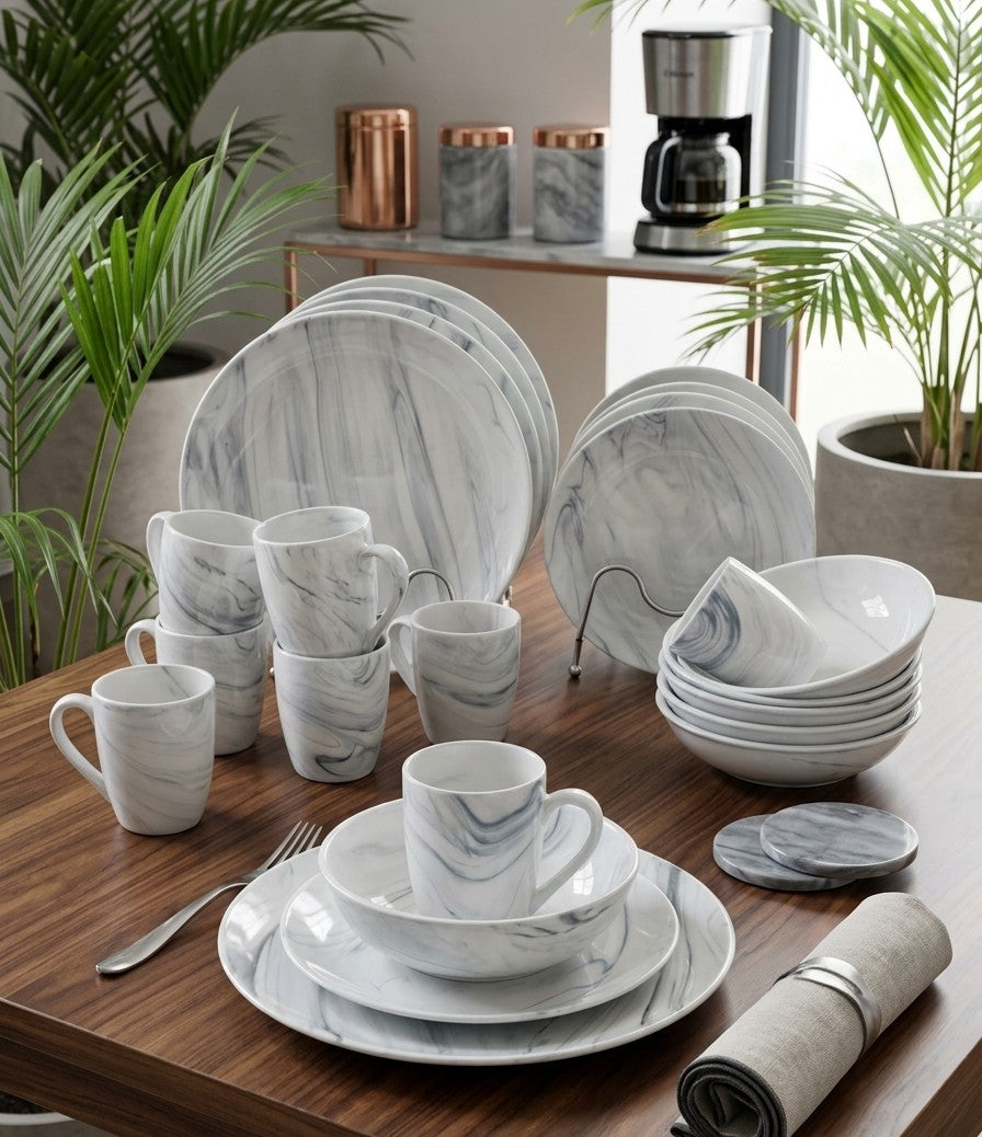 24-piece marble dinnerware set including cups, bowls, side plates, and dinner plates for modern dining. 