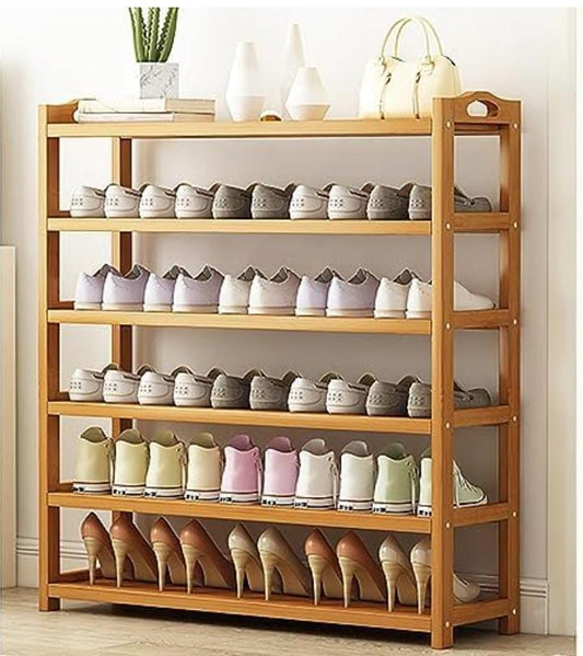 Minimalist shoe rack and entryway storage organizer with multiple shelves.