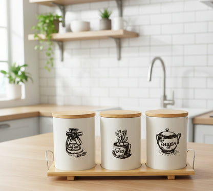 Three-piece ceramic canisters set with bamboo stand for kitchen storage.