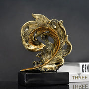Modern art feather decorative statue designed for stylish home or office décor, adding an elegant artistic touch to interiors.