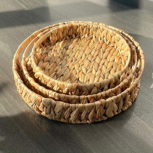 Handmade wicker tray without handles for decorative display and home organization.