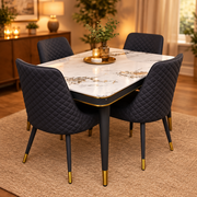 4 seater marble dining table with microfibre chairs and metallic black legs with gold finishing