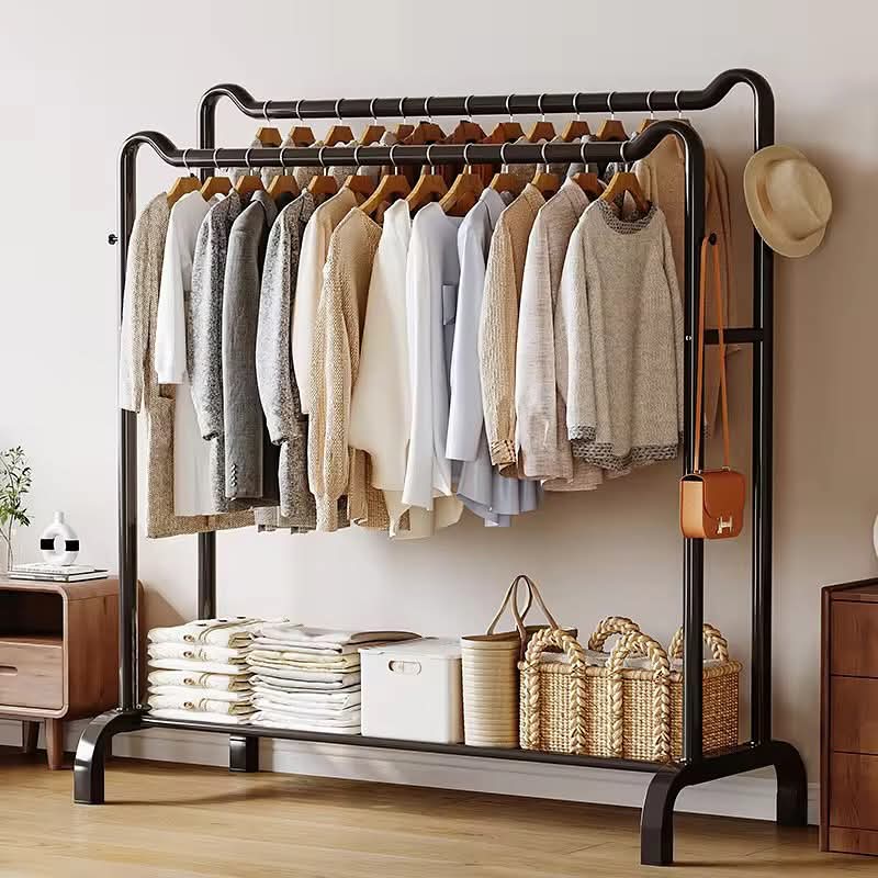 Large floor standing garment rack with double poles and lower storage shelf.