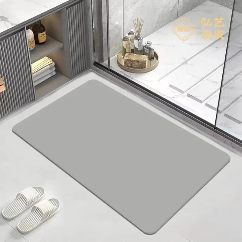 Super absorbent non slip bath mat with rubber backing in black and grey.