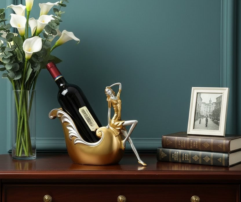 Gold resin statue wine bottle holder measuring 32×11×24 cm for tabletop display