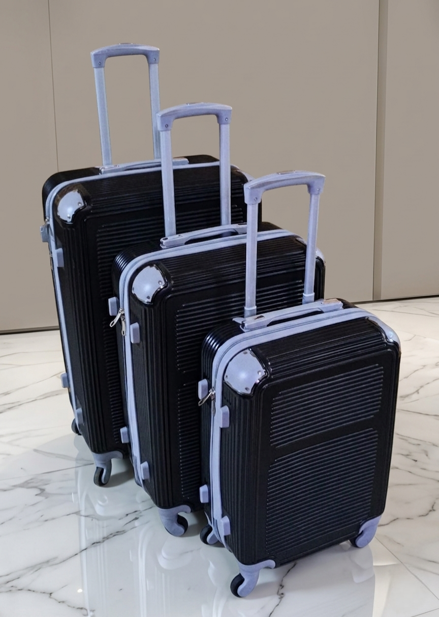 3-Piece fibre suitcase set with spinner wheels and telescopic handles in multiple sizes