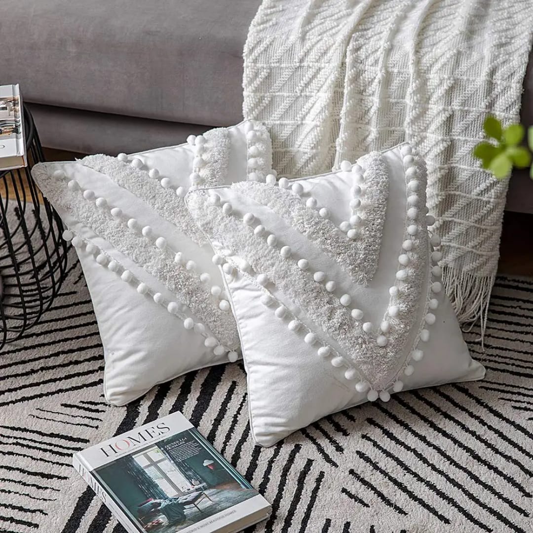 Tufted throw pillow cover with white pompom trim for stylish sofa, bed, and home decoration.