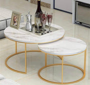 White glass marble nesting tables with gold metal legs in two sizes