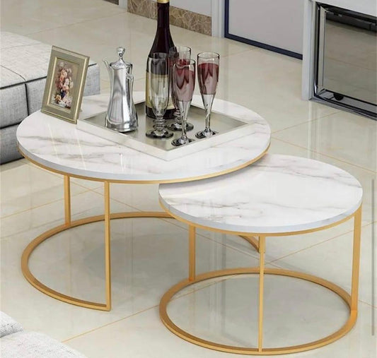 White glass marble nesting tables with gold metal legs in two sizes