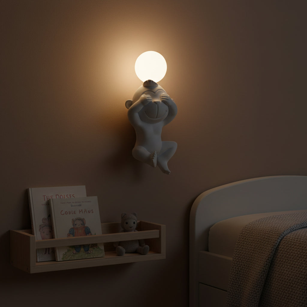 Dawood Lifestyle & Gadgets kes monkey see no evil LED wall sconce in matte white resin with frosted globe light, decorative wall-mounted lamp for kids' rooms and playful interiors.