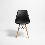 Black padded Eames chair with cushioned seat and modern design for dining, office, and home seating use