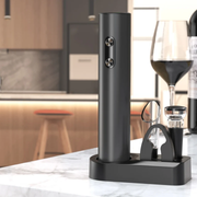 Battery-operated electric wine opener set with aerator, stopper, foil cutter, and storage base.
