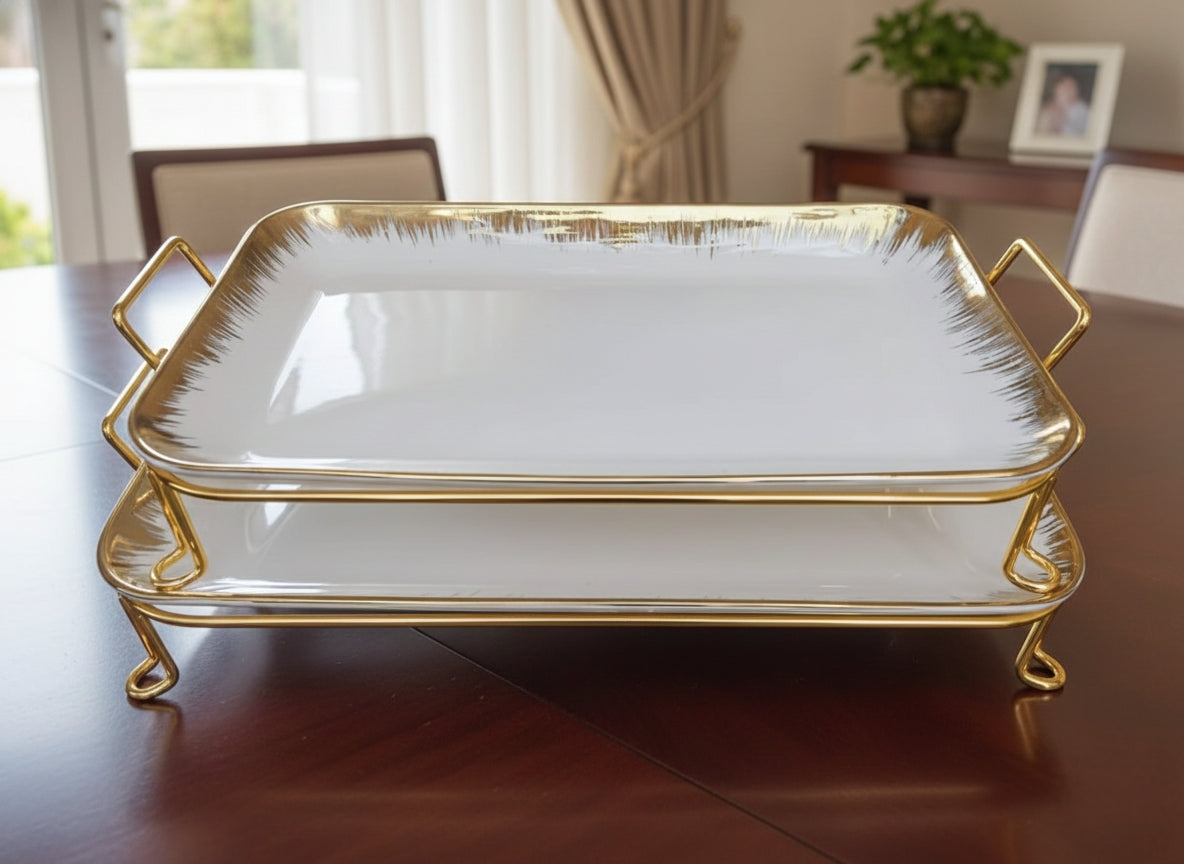 Two-piece ceramic serving tray set with gold stand for snacks and desserts.