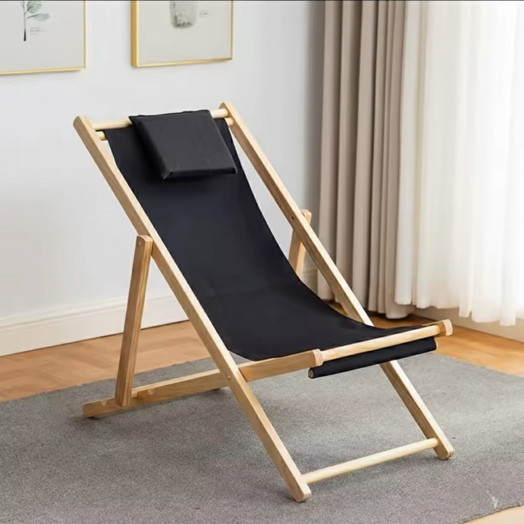 Foldable reclining balcony chair in black or orange with matching bamboo table for outdoor use.