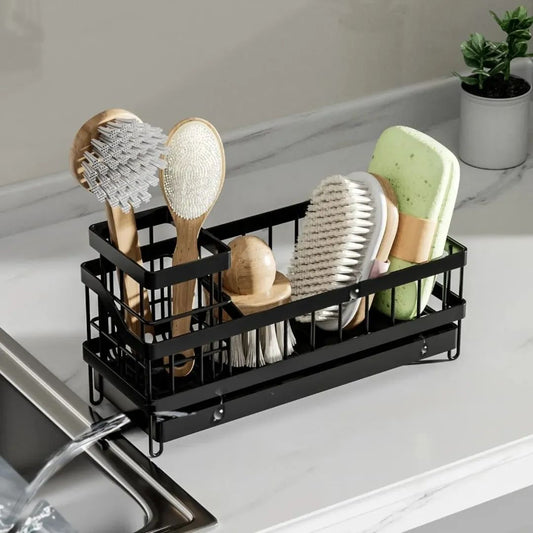 Kitchen sink caddy with carbon steel frame and draining tray for organizing sponges and detergent in black finish.