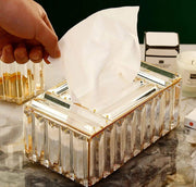 Gold crystal serviette box with elegant decorative design for stylish dining table and home décor.