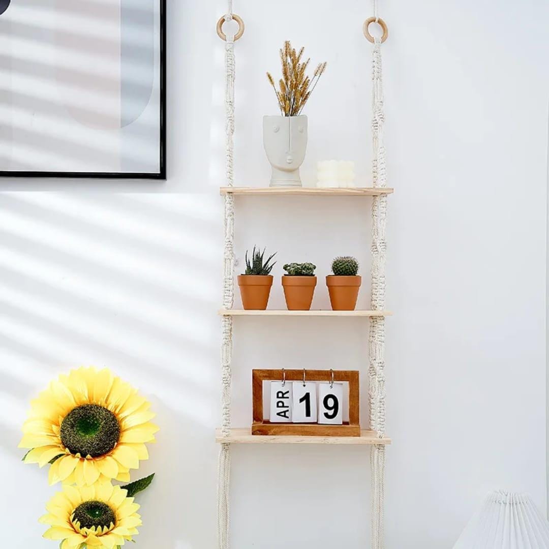 Three-tier floating shelves made of pine wood and cotton rope, bohemian style wall storage for décor and plants