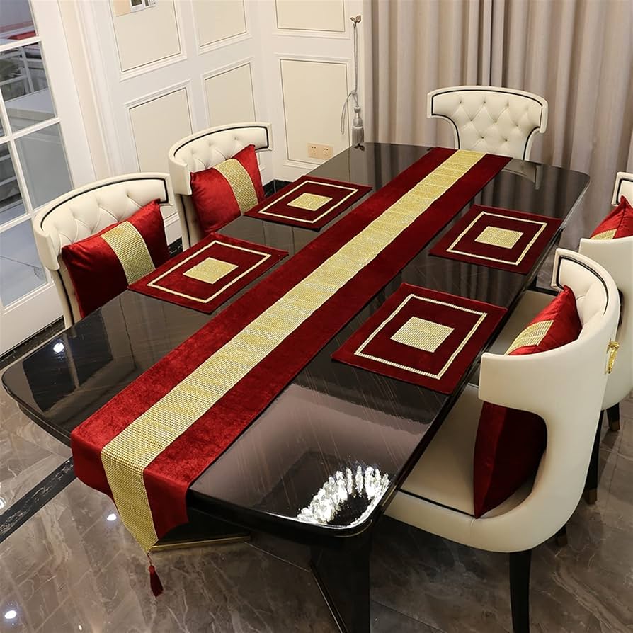 Decorative table runner with matching placemats arranged on dining table