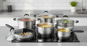 12-piece Edel Hoff stainless steel cookware set with glass lids and black handles, including sufurias, saucepan, and frying pan