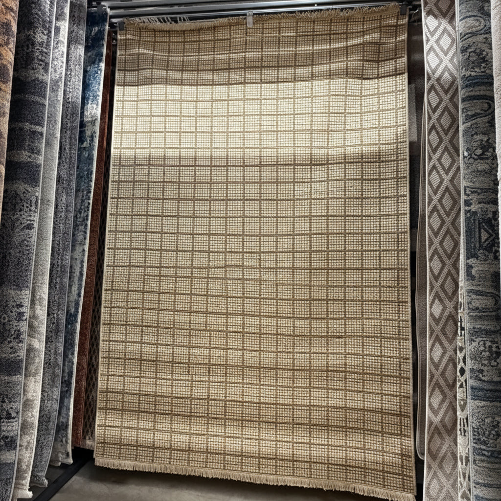 Vedantu grid pattern light brown carpet rug with modern minimalist design suitable for small spaces and living room décor.