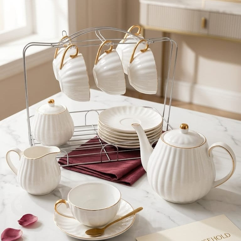 15 piece tea set with 6 coffee cups, 6 saucers, teapot, creamer pitcher, and sugar bowl.