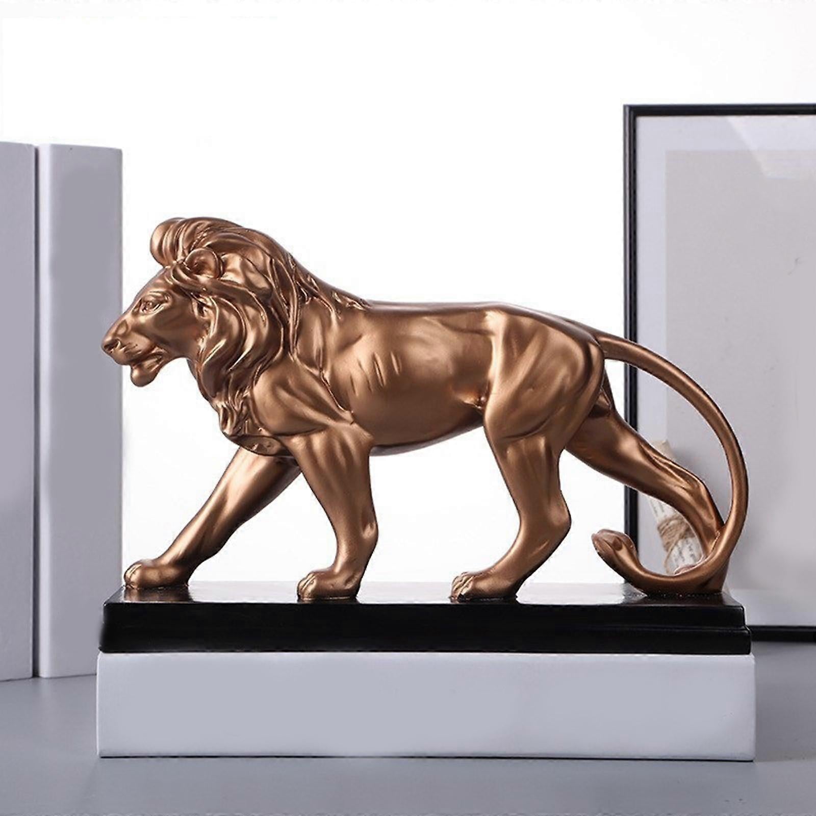 Resin lion sculpture designed as a bold decorative accent for home or office interiors. 