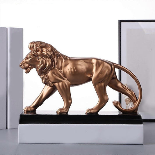 Resin lion sculpture designed as a bold decorative accent for home or office interiors. 