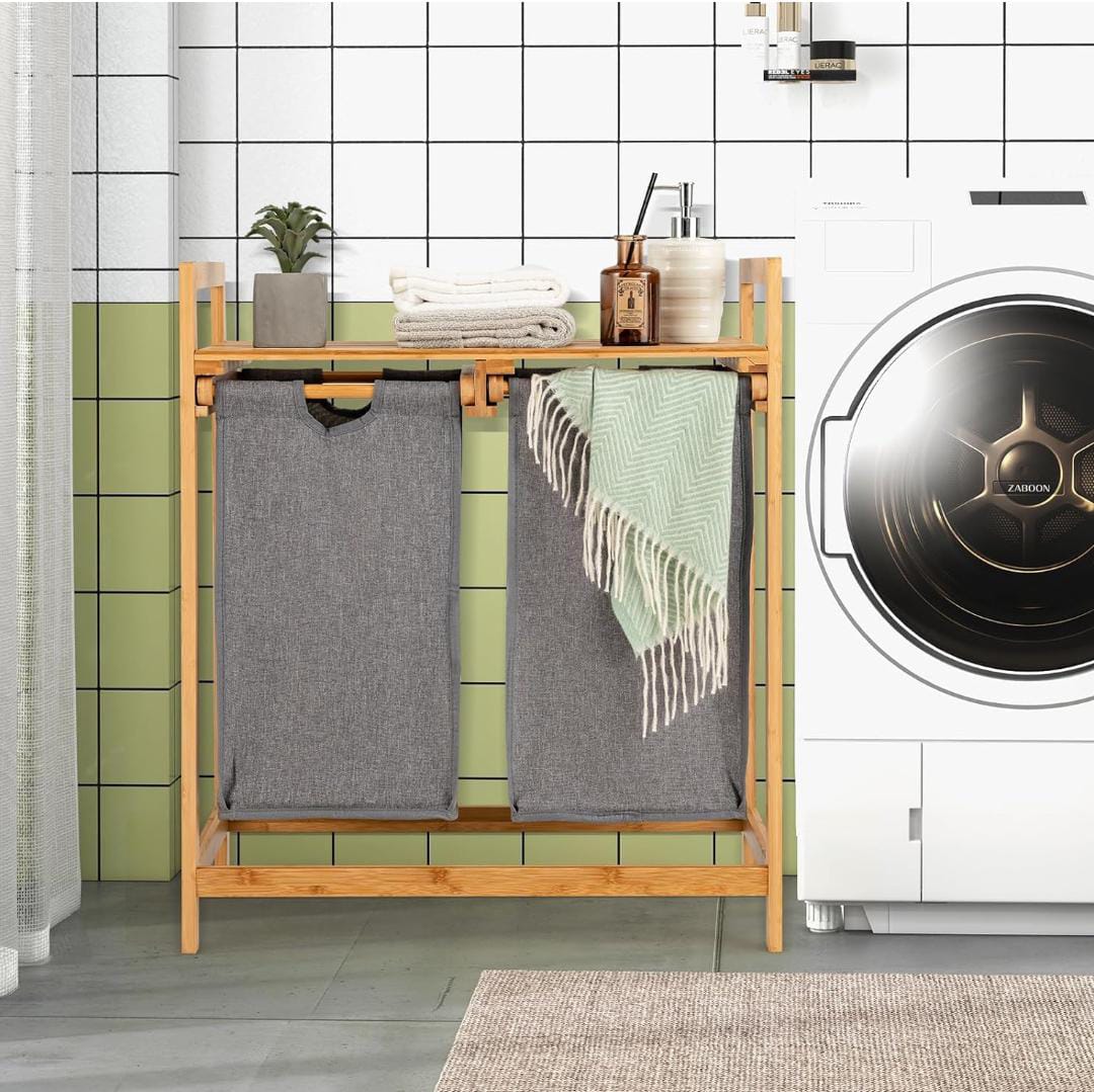 Bamboo twin partition laundry organizer with pull-out bags and storage shelf for home laundry organization