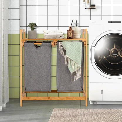 Bamboo twin partition laundry organizer with pull-out bags and storage shelf for home laundry organization