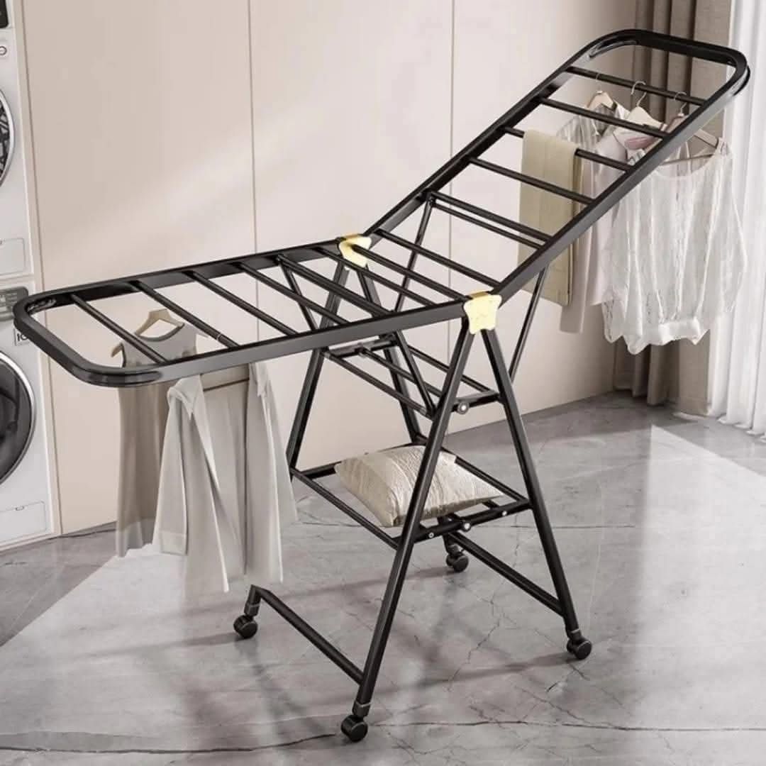 Foldable black clothes drying rack with wheels for indoor and outdoor laundry drying and storage