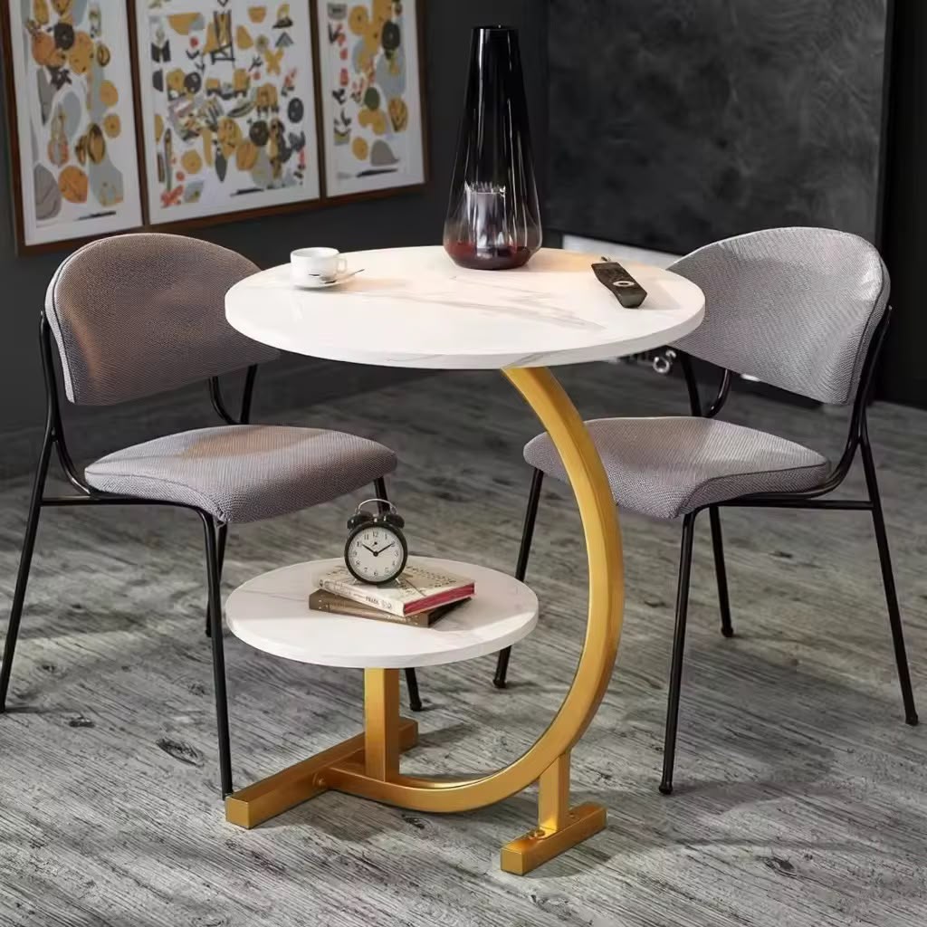 Double layer C shaped side table with marble effect tabletop and gold finished metal frame, available in black and white.